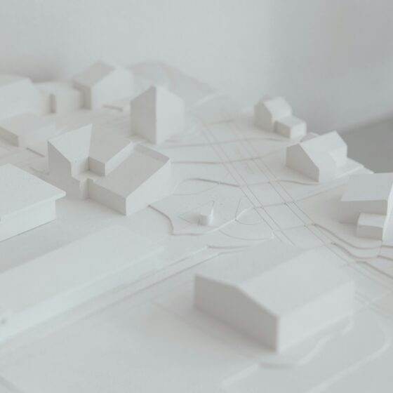 Miniature building models representing a completed low-rise construction site