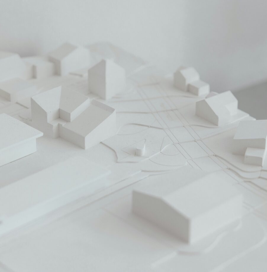 Miniature building models representing a completed low-rise construction site